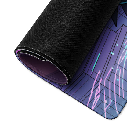 A rolled-up black gaming mouse pad with a vibrant purple and pink neon vaporwave cityscape design
