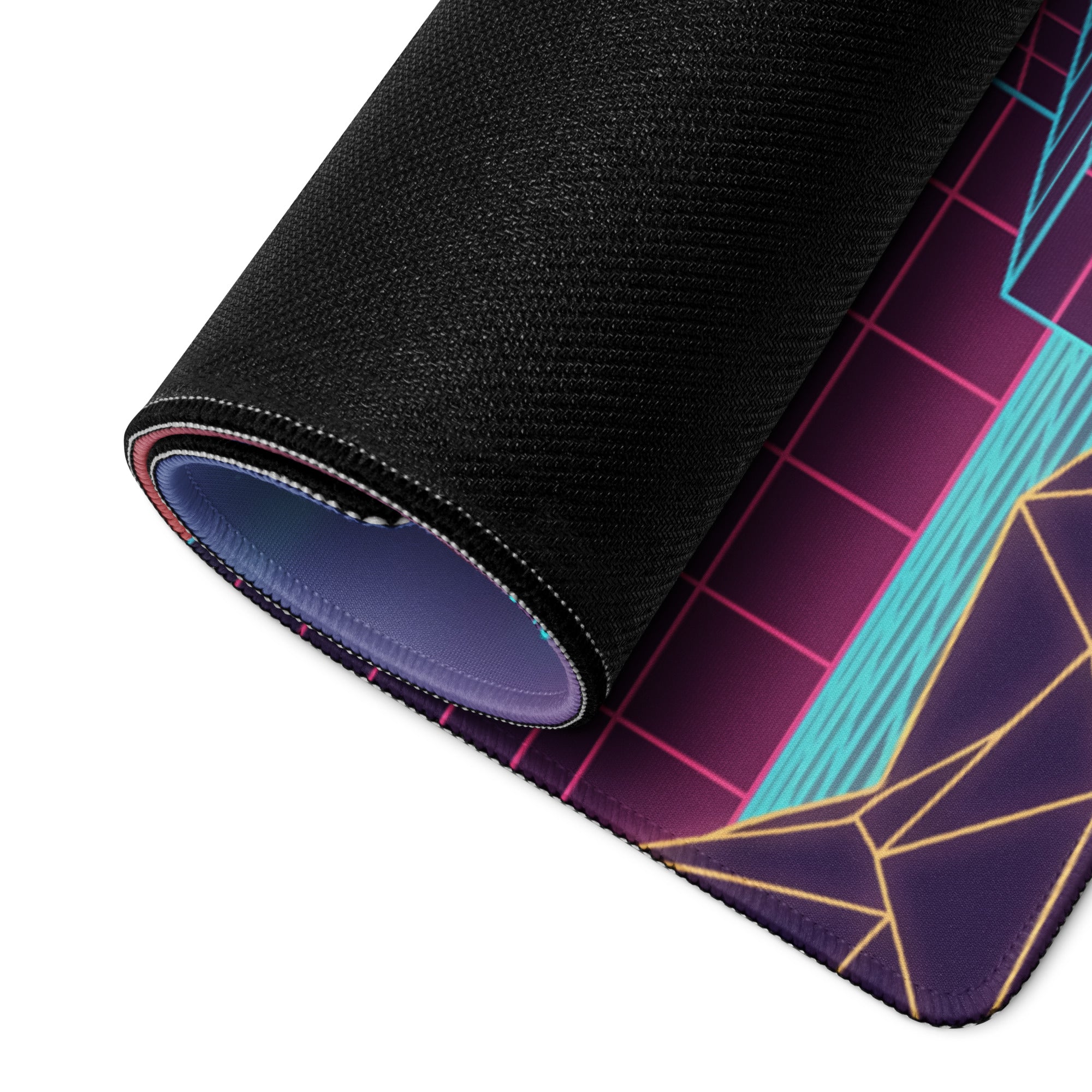 A rolled-up neon dragon vaporwave gaming mouse pad with vibrant pink cyan and gold geometric lines on dark purple background