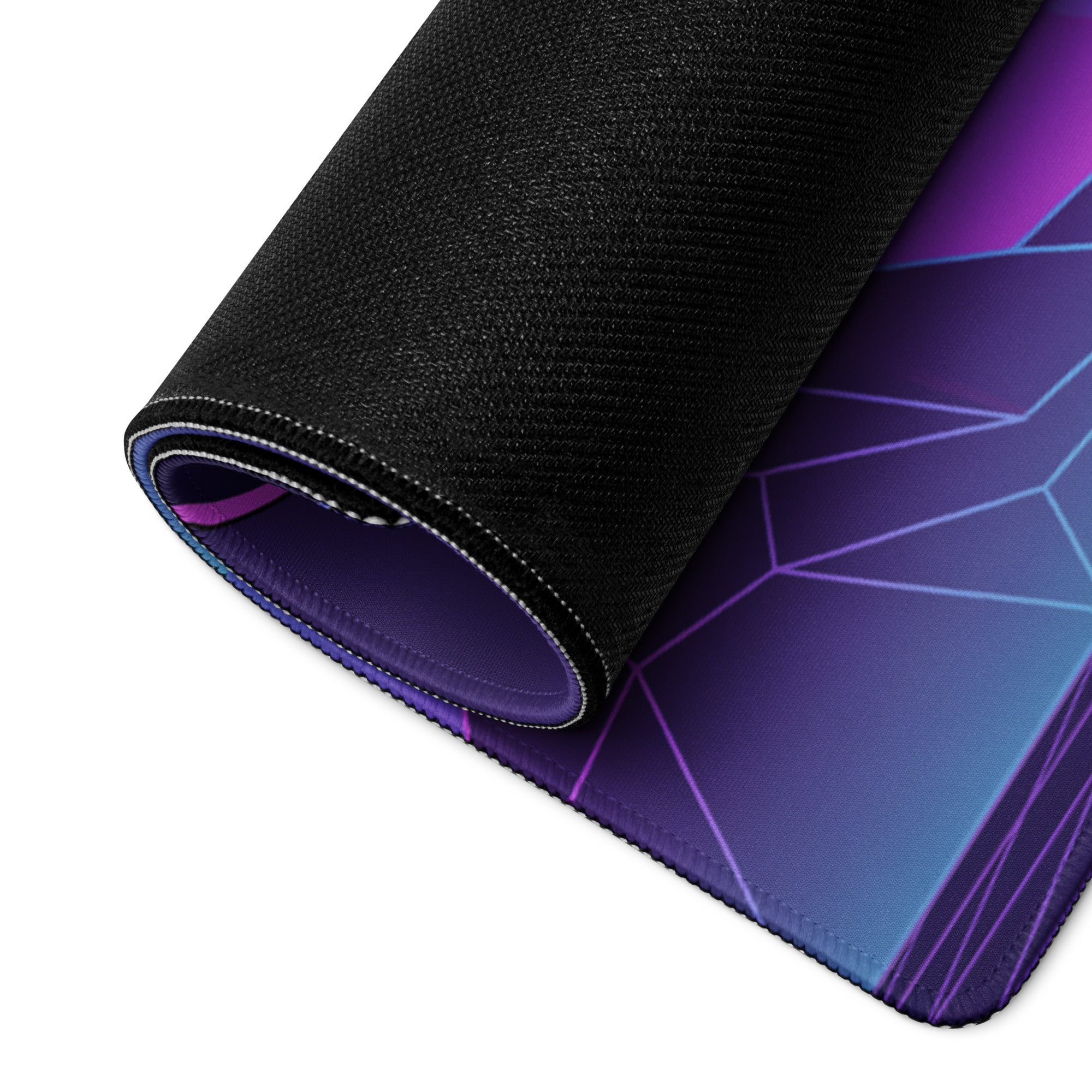 Rolled-up neon knight vaporwave mouse pad with black textured underside and purple blue gradient geometric surface
