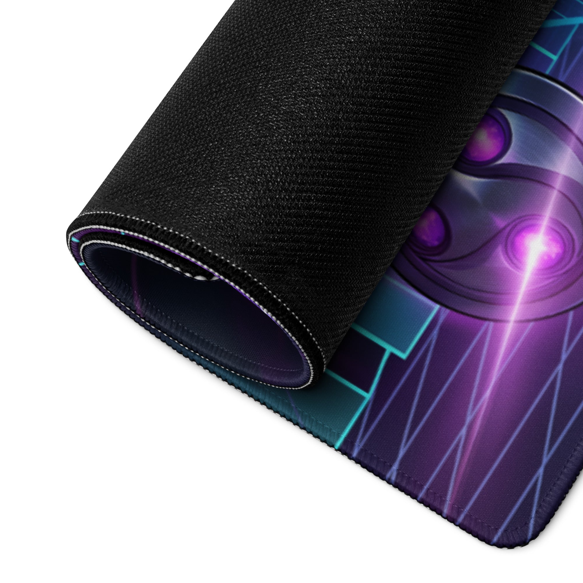 A rolled-up black gaming mousepad featuring a vibrant purple and teal infinity gauntlet graphic with glowing energy effects