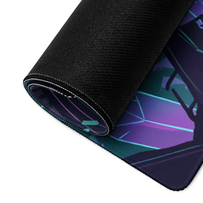 A rolled-up black gaming mousepad with a vibrant purple and teal vaporwave geometric design for desk setup