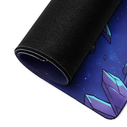 A rolled-up neon skull vaporwave mouse pad with a cosmic purple and teal crystal design on a starry blue background