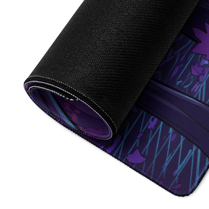 A rolled-up black gaming mousepad with a vibrant purple and blue anime-style neon forest dragon design