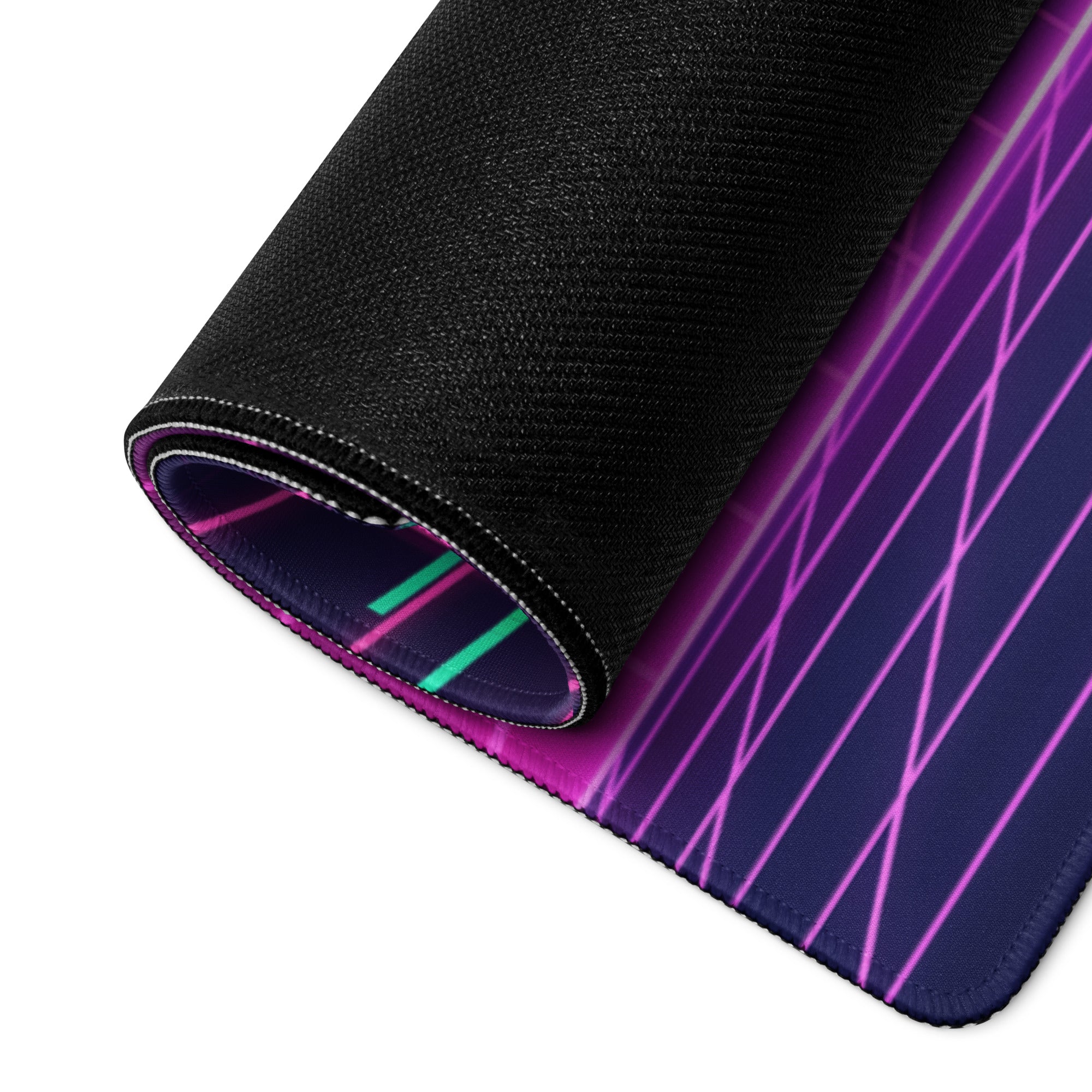 A rolled-up neon vaporwave guitar gaming mouse pad with black textured outer layer and vibrant pink purple teal lines