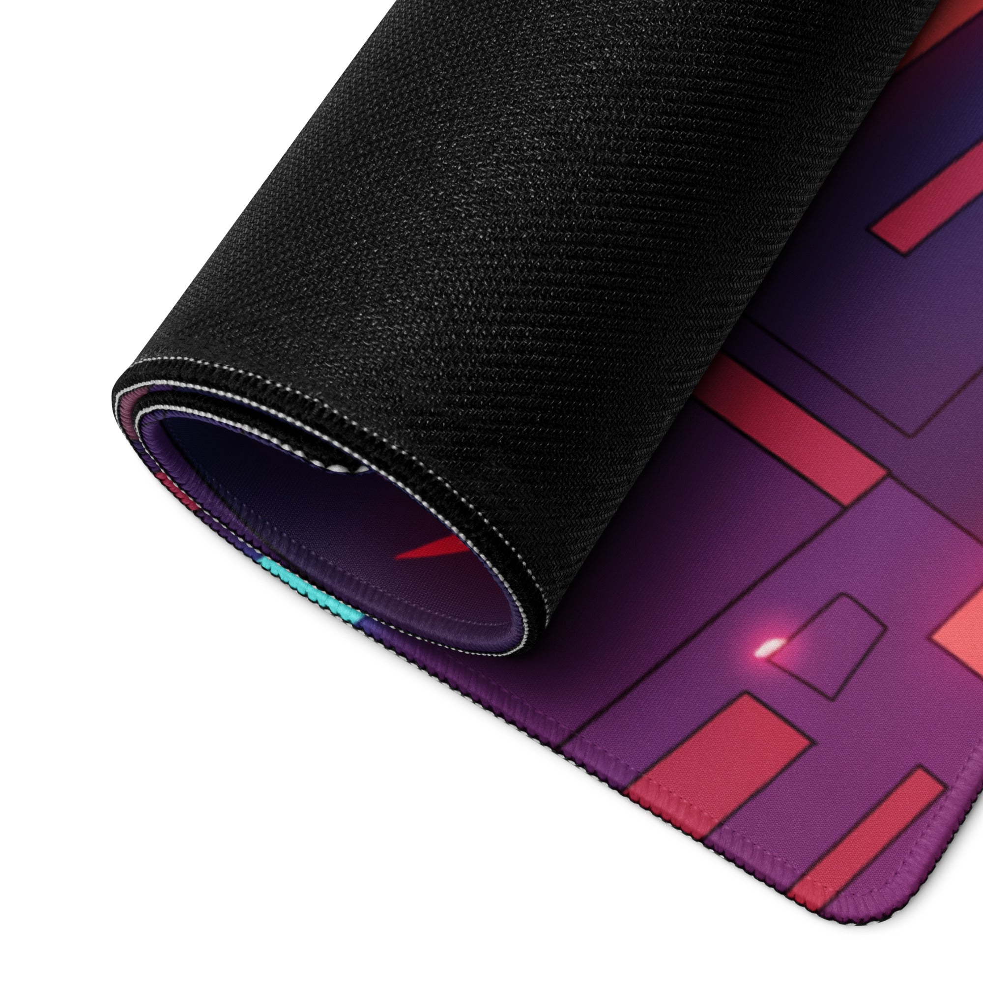 A rolled-up vaporwave neon nexus gaming mouse pad with vibrant purple and red geometric design and black fabric edges