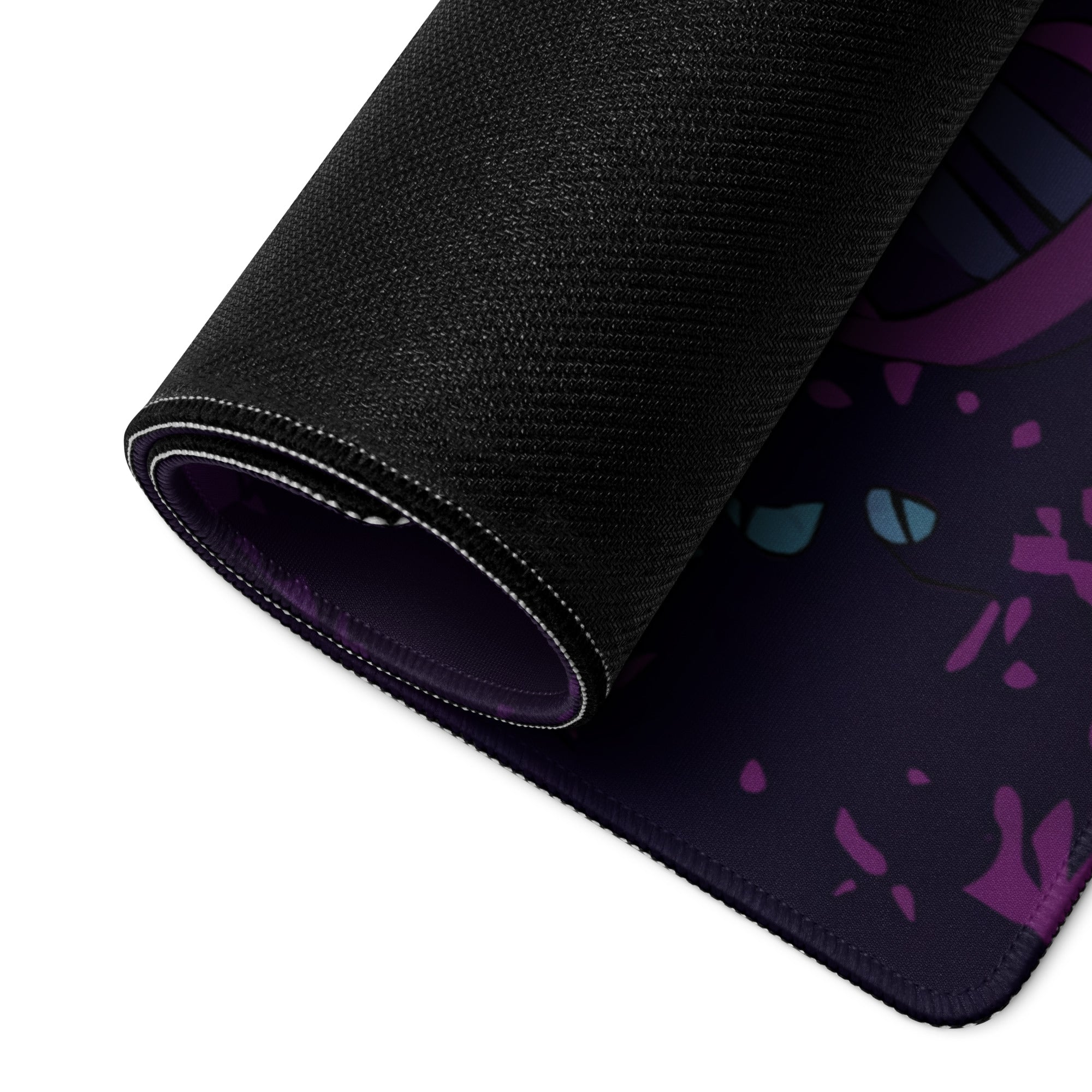 Black textured gaming mouse pad with purple and teal vaporwave jungle design and stitched hem rolled at the edge