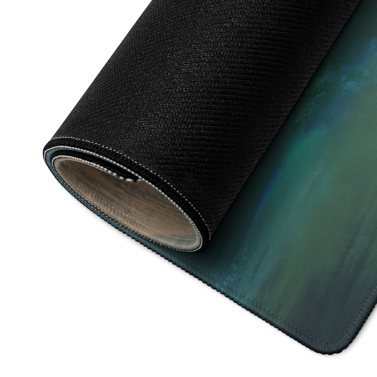 Black textured aston martin valkyrie inspired aero edition desk mat with gradient teal green design and stitched edge