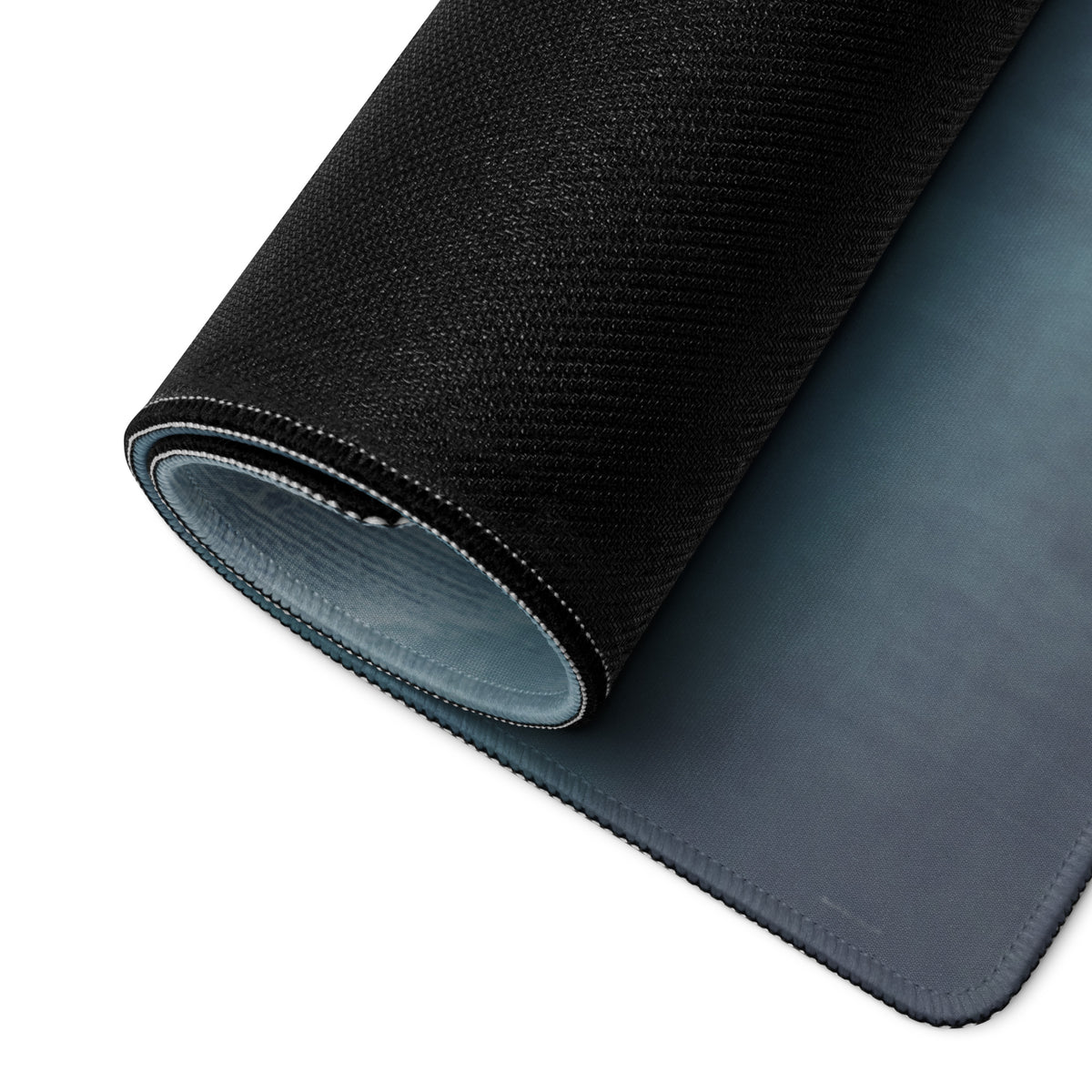 Black textured gaming mousepad with smooth gray underside and stitched edges inspired by Porsche 911 GT3 RS crimson aerial desk mat