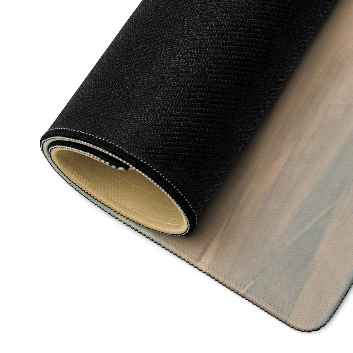 Black textured Lamborghini Huracán inspired matte graphite desk mat with beige inner lining and stitched edges for mouse setup