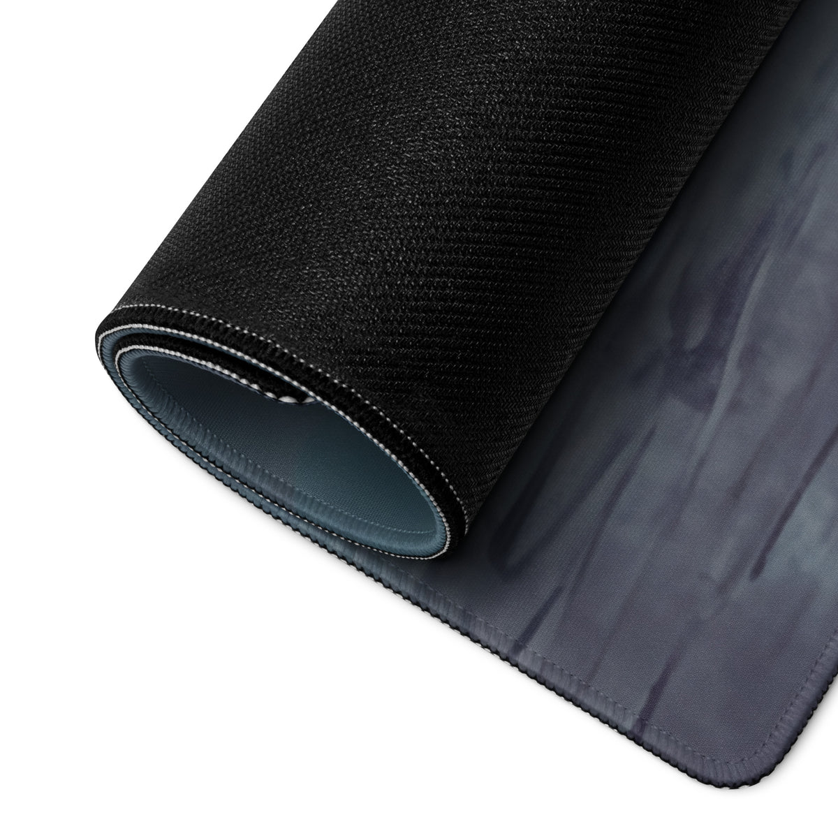 Black textured lamborghini huracán inspired cyber camo desk mat with subtle gray gradient and stitched edges for gaming