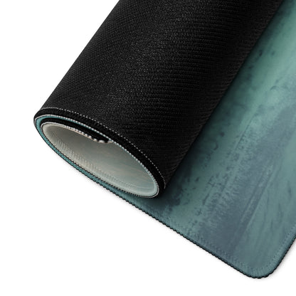 Black and teal gradient Mercedes-AMG GT inspired carmine beast desk pad with textured fabric surface and non-slip base