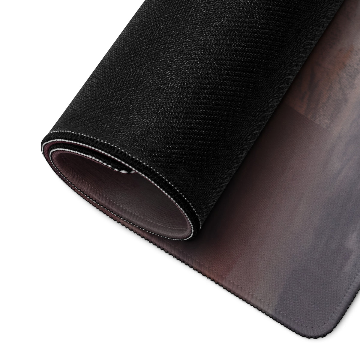 Black textured gaming mousepad with dark brown leather underside and white stitched edge inspired by Lamborghini Huracán Spyder
