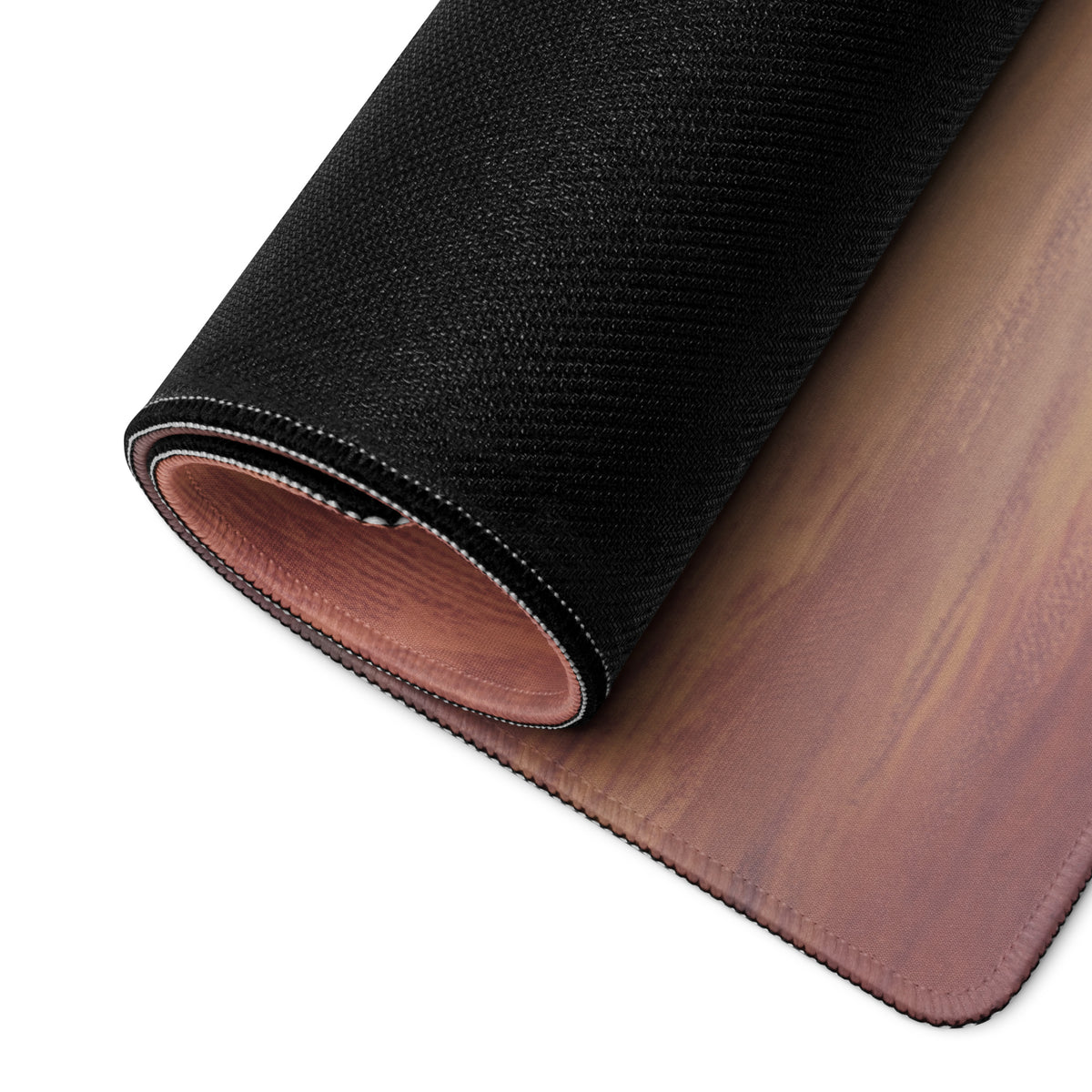 Black textured outer layer with smooth warm wood grain and pinkish inner lining on porsche 911 gt3 rs inspired violet accent desk pad