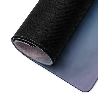 Black textured outer layer and smooth blue to purple gradient inner surface of lamborghini huracán inspired pearl white desk pad rolled neatly
