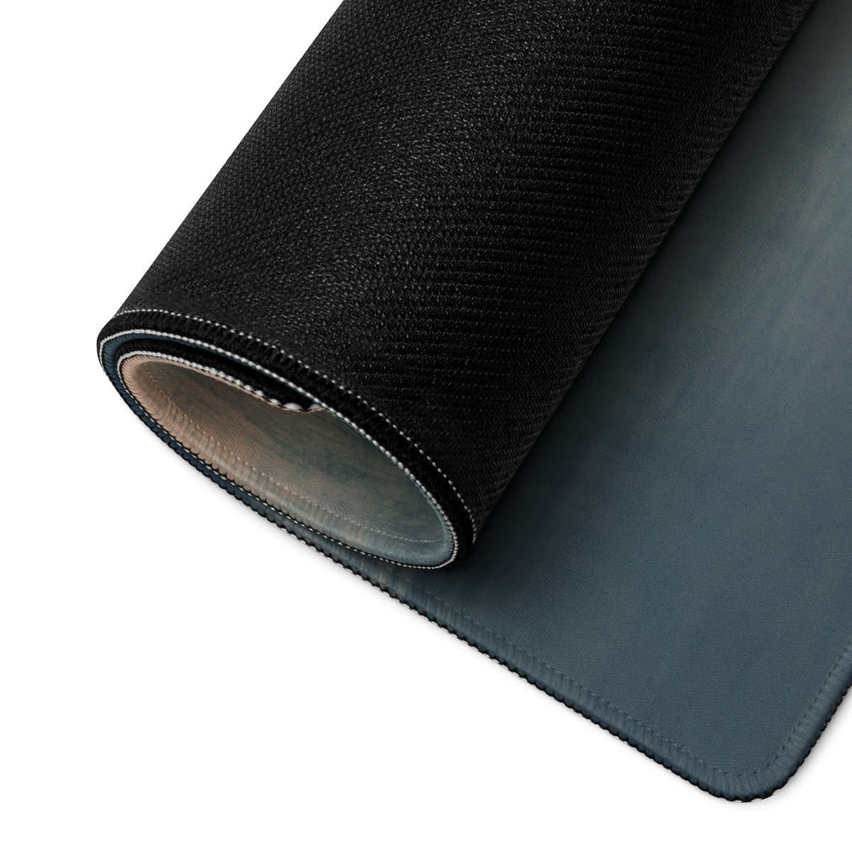 Black textured Ferrari 488 inspired extended desk pad with subtle gray underside and stitched edges for non slip use