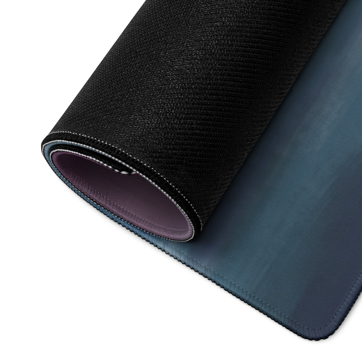 Black textured gaming mousepad with a gradient blue stitched underside inspired by Porsche 911 GT3 RS design
