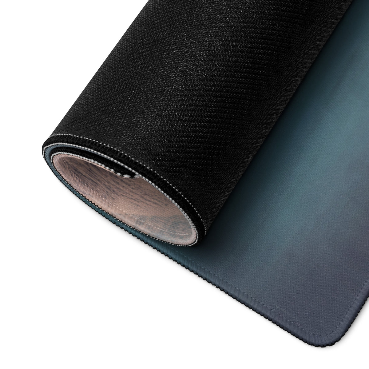 Black textured cloth mousepad with subtle blue gradient finish for low friction setup inspired by mclaren senna