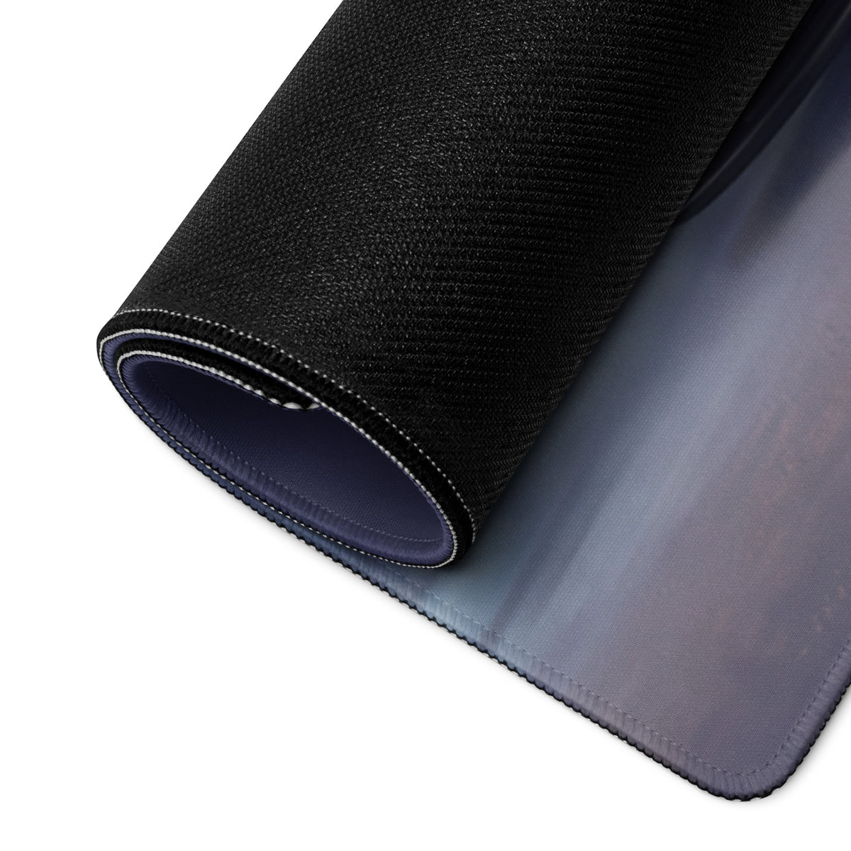 Black textured mousepad with subtle gradient blue underside and stitched edges mclaren p1 inspired charcoal profile desk mat