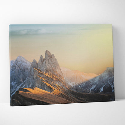 Cinematic mountain sunrise canvas art with jagged peaks in gold and blue