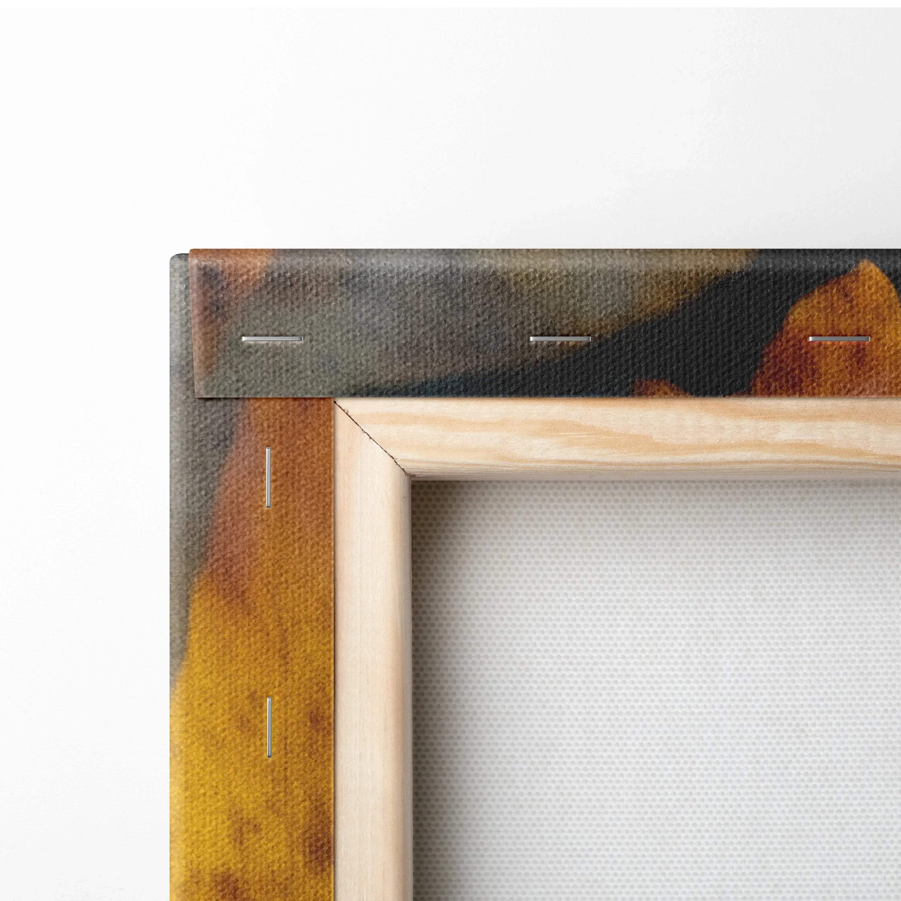 Close-up of wooden frame and textured canvas corner with autumn leaf design wall art.