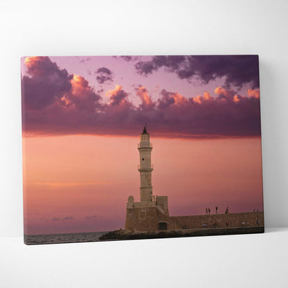 Canvas wall art featuring a lighthouse at sunset with purple and orange sky clouds.