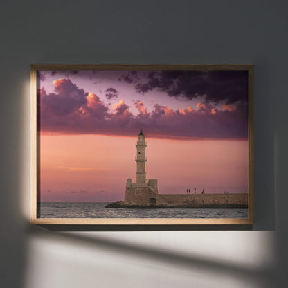 Sunset wall art poster featuring a lighthouse and dramatic purple clouds over calm sea.