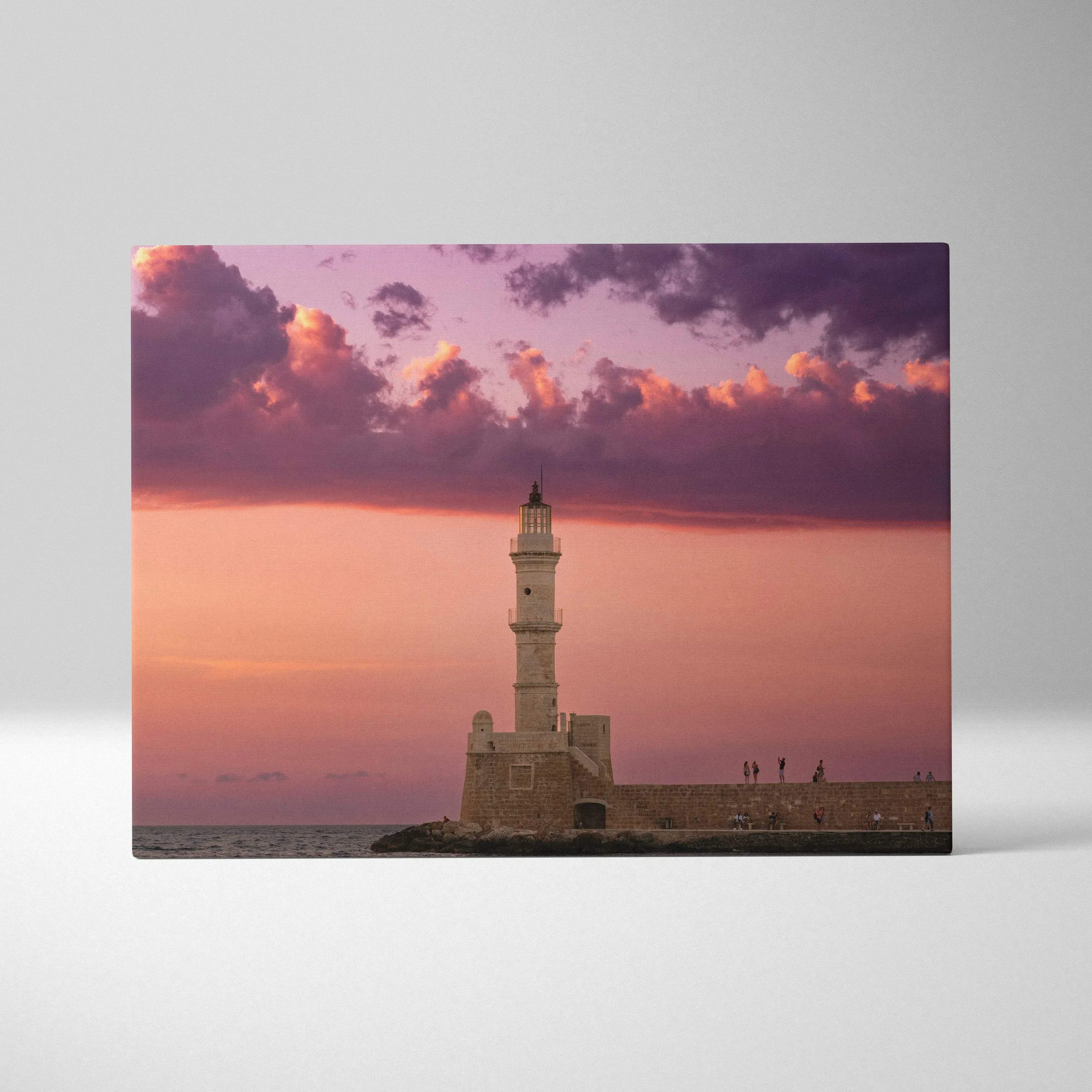 Canvas wall art featuring a lighthouse at sunset with vibrant purple and orange sky clouds.