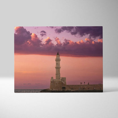 Canvas wall art featuring a lighthouse at sunset with vibrant purple and orange sky clouds.