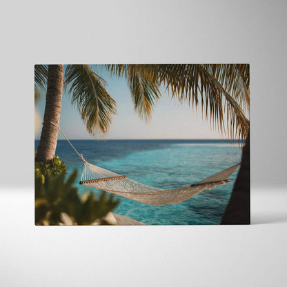 Serene beach scene with hammock between palm trees over turquoise ocean on canvas wall art.