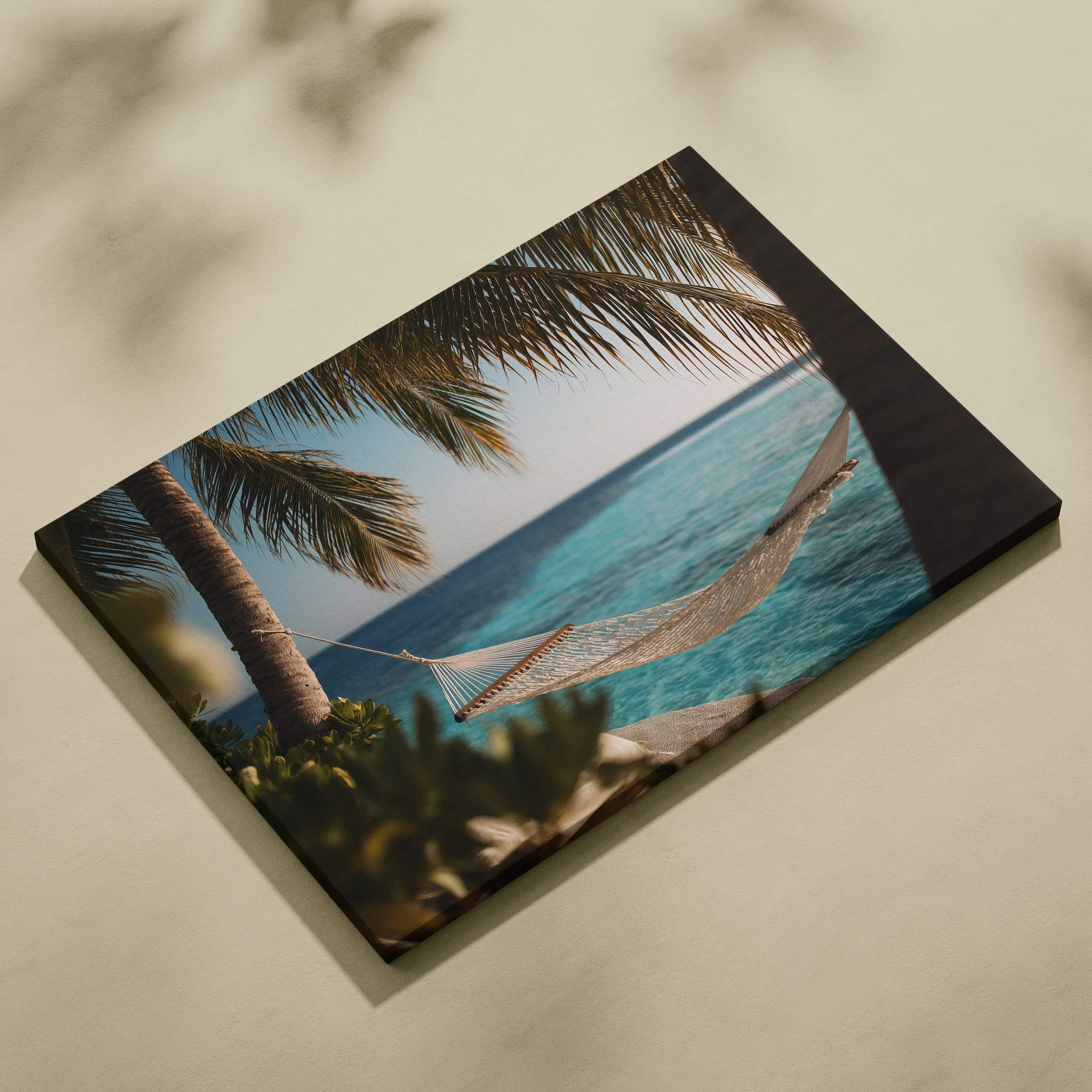Serene beach canvas wall art with hammock between palm trees over turquoise ocean.