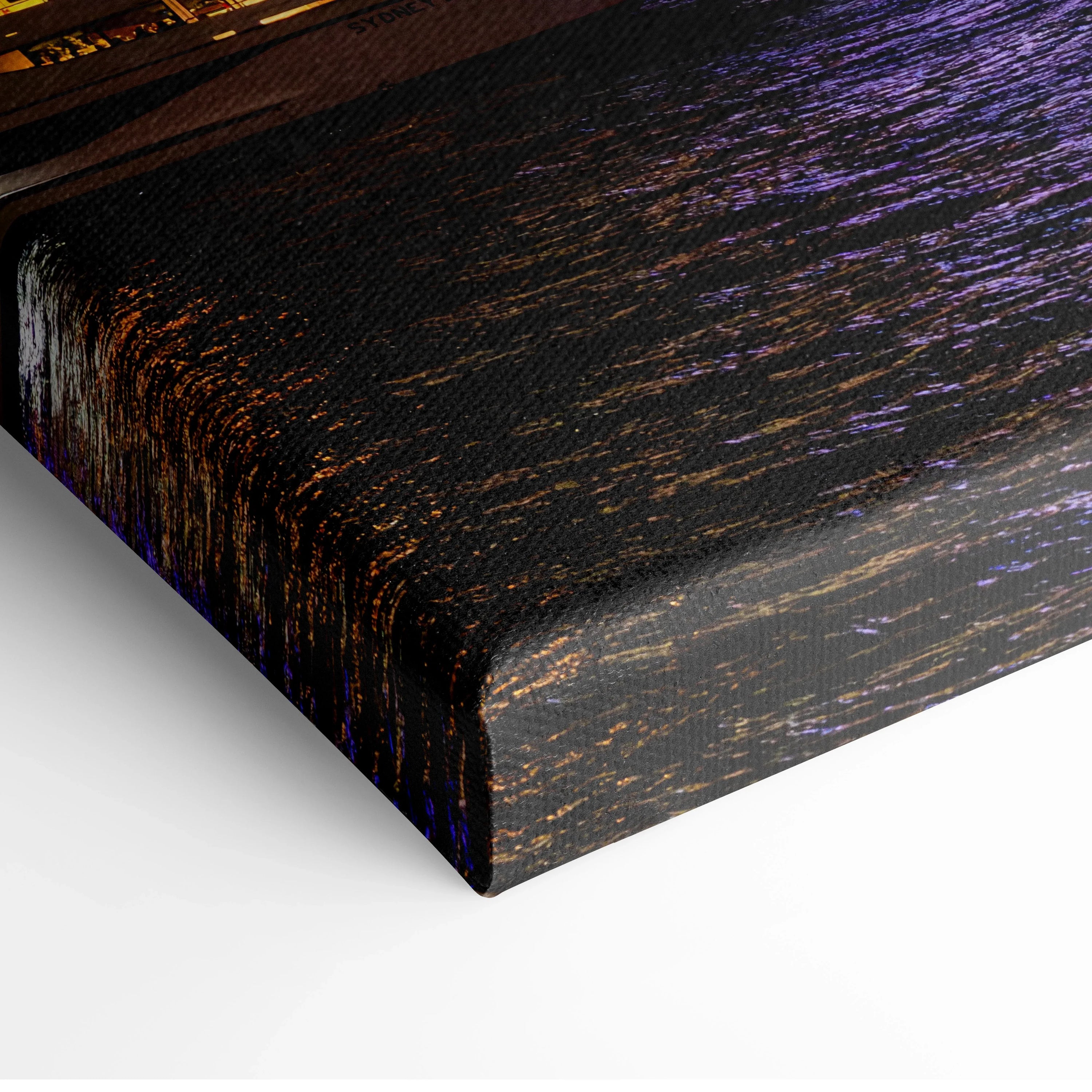 Close-up of urban skyline canvas wall art print with textured cityscape and dark tones.