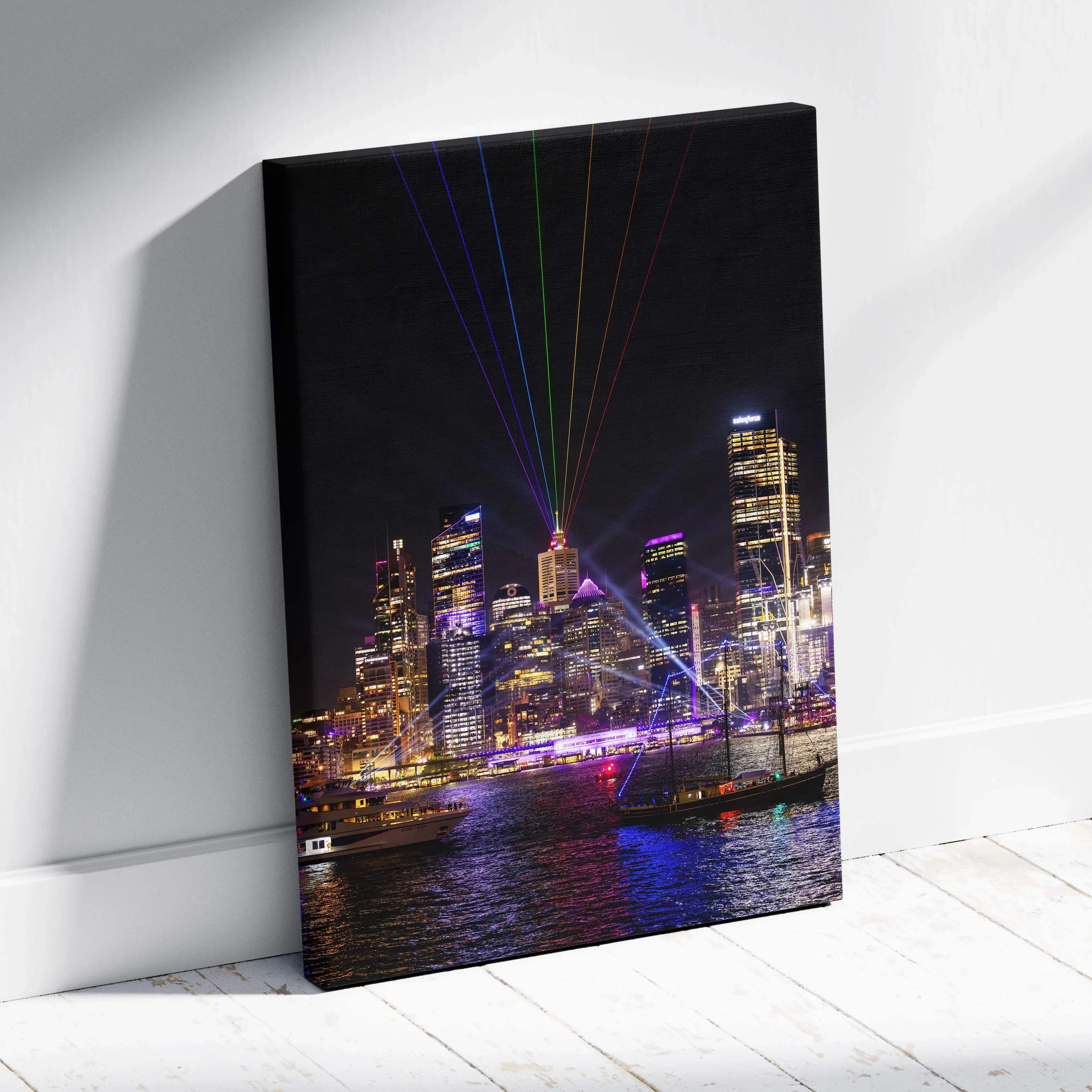 Neon laser night cityscape canvas wall art with vibrant multicolor illuminated skyscrapers and laser beams over waterfront
