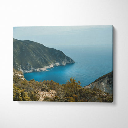 Mountain and ocean landscape canvas wall art with rocky cliffs and calm blue water.
