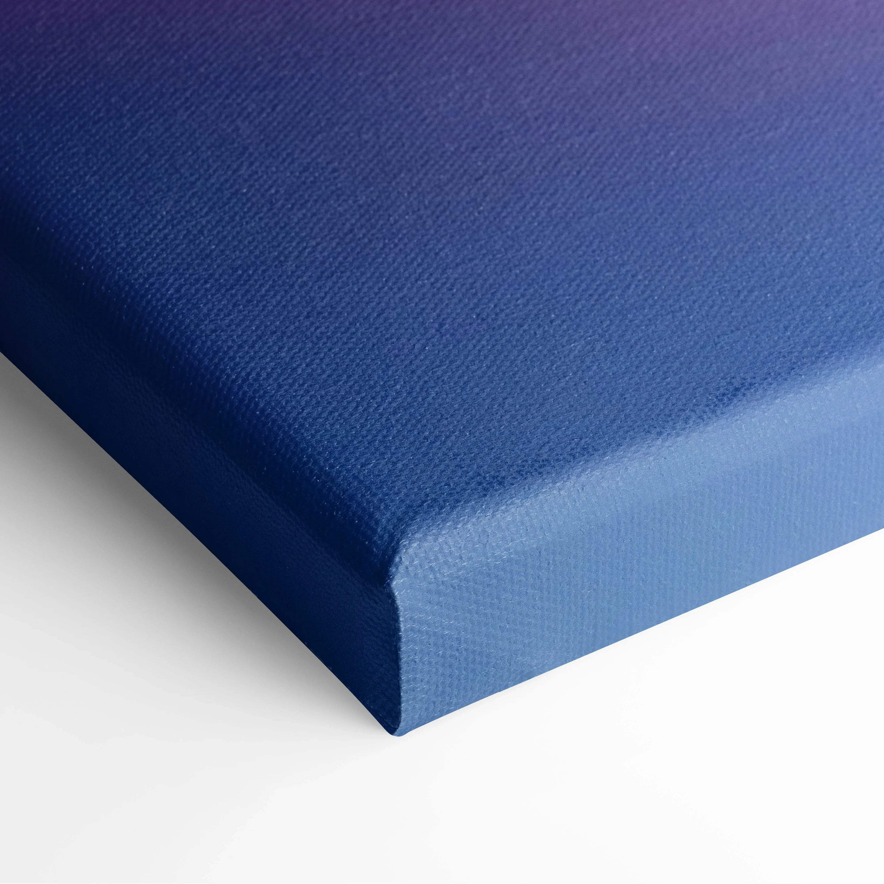 Blue canvas print with navy to light gradient and pink purple tones