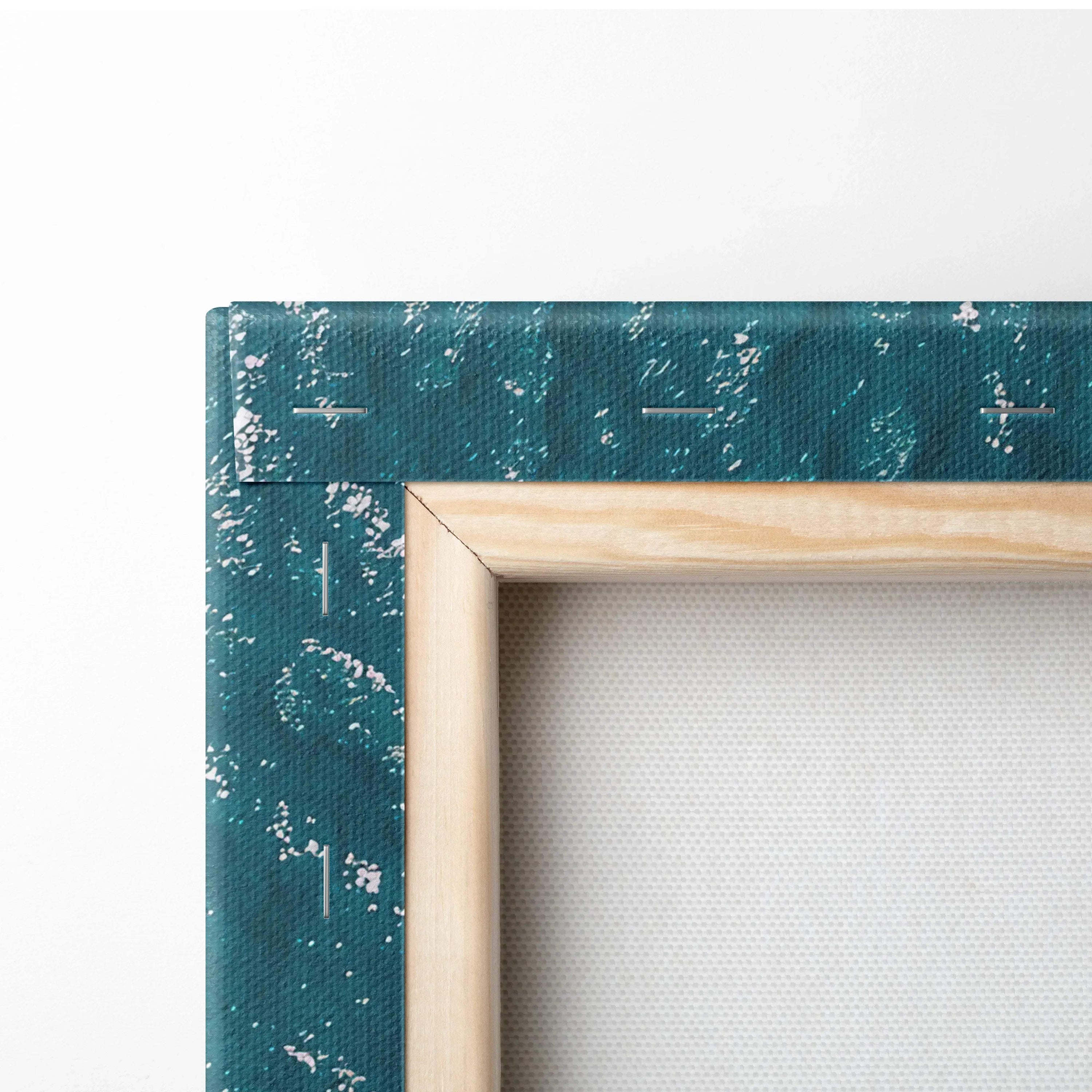 Teal textured canvas corner with natural wood frame for wall art display.