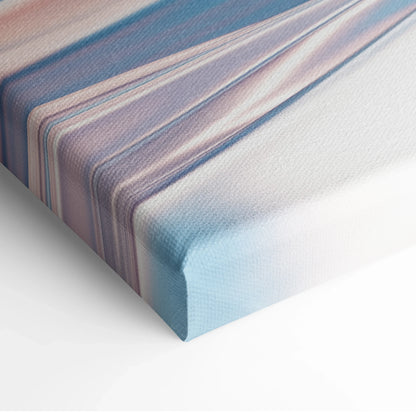 Canvas wall art with soft blue and pink abstract swirl design, close-up of wrapped edge.