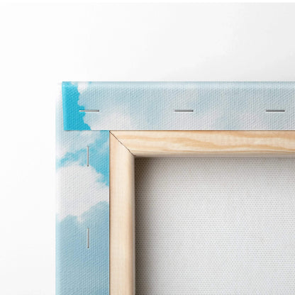 Close-up of stretched canvas corner with wooden frame and sky blue wall art print.