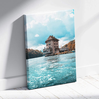 Canvas wall art featuring serene urban building by vibrant blue water under bright sky.