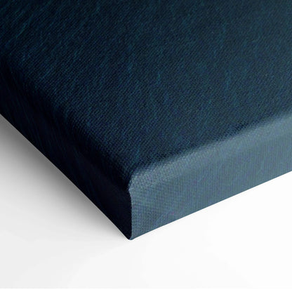Close-up of dark blue canvas corner with textured fabric for wall art display.