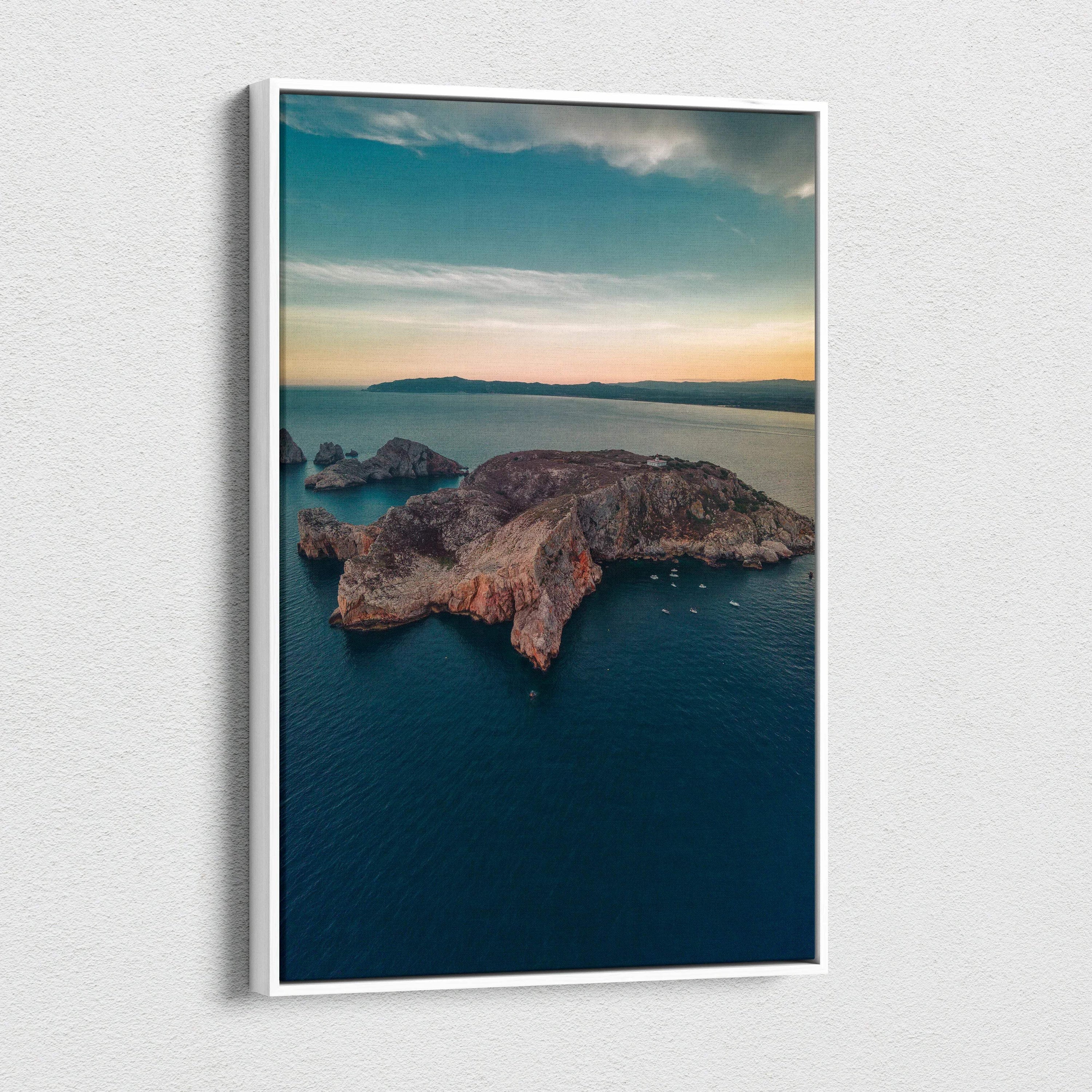 Vertical canvas wall art featuring tranquil mountains and beach landscape at sunset.