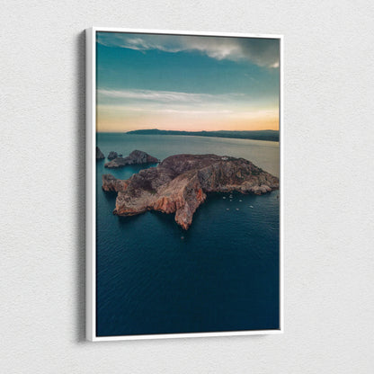Vertical canvas wall art featuring tranquil mountains and beach landscape at sunset.