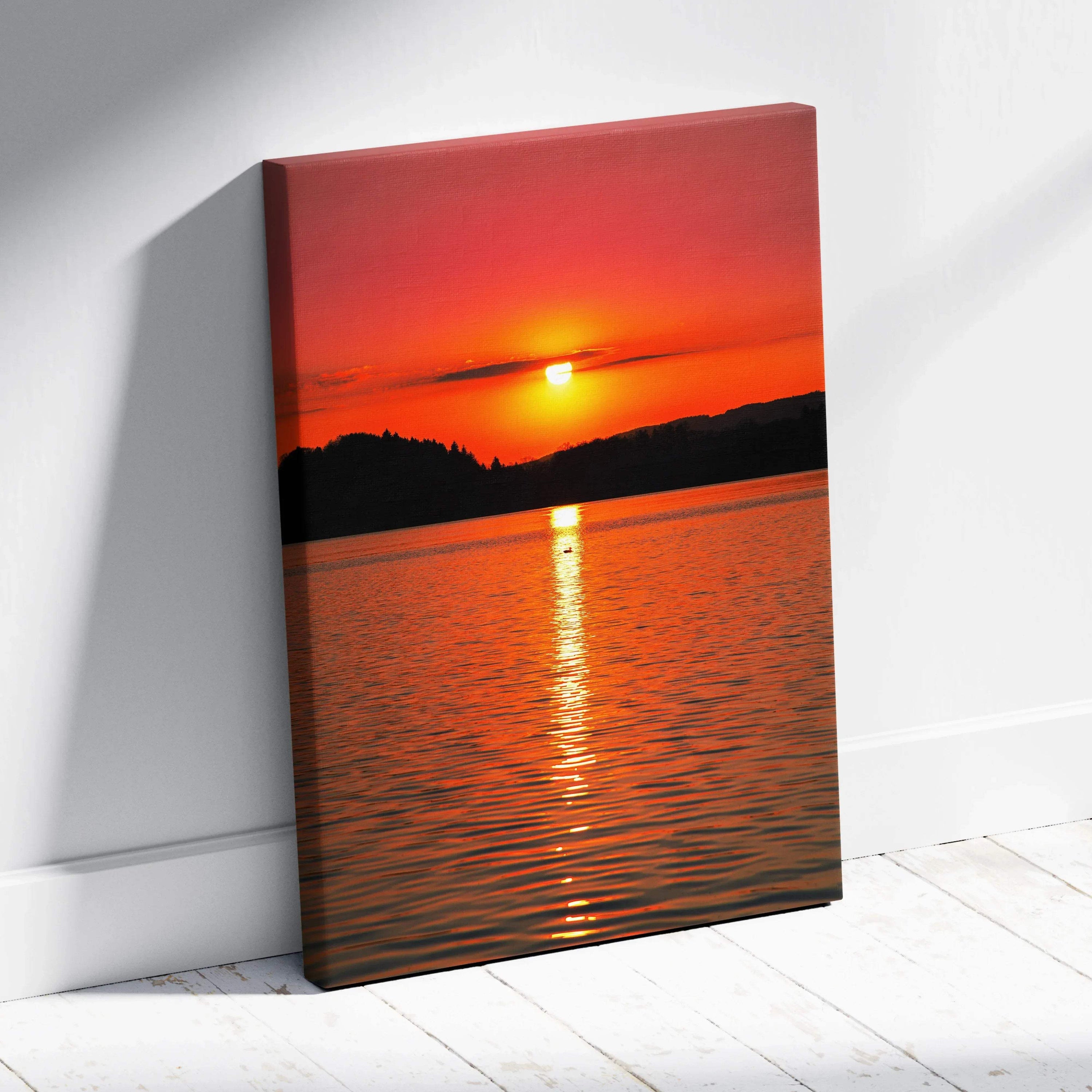 Vivid ocean sunset with glowing orange sky and reflective water on vertical canvas wall art.