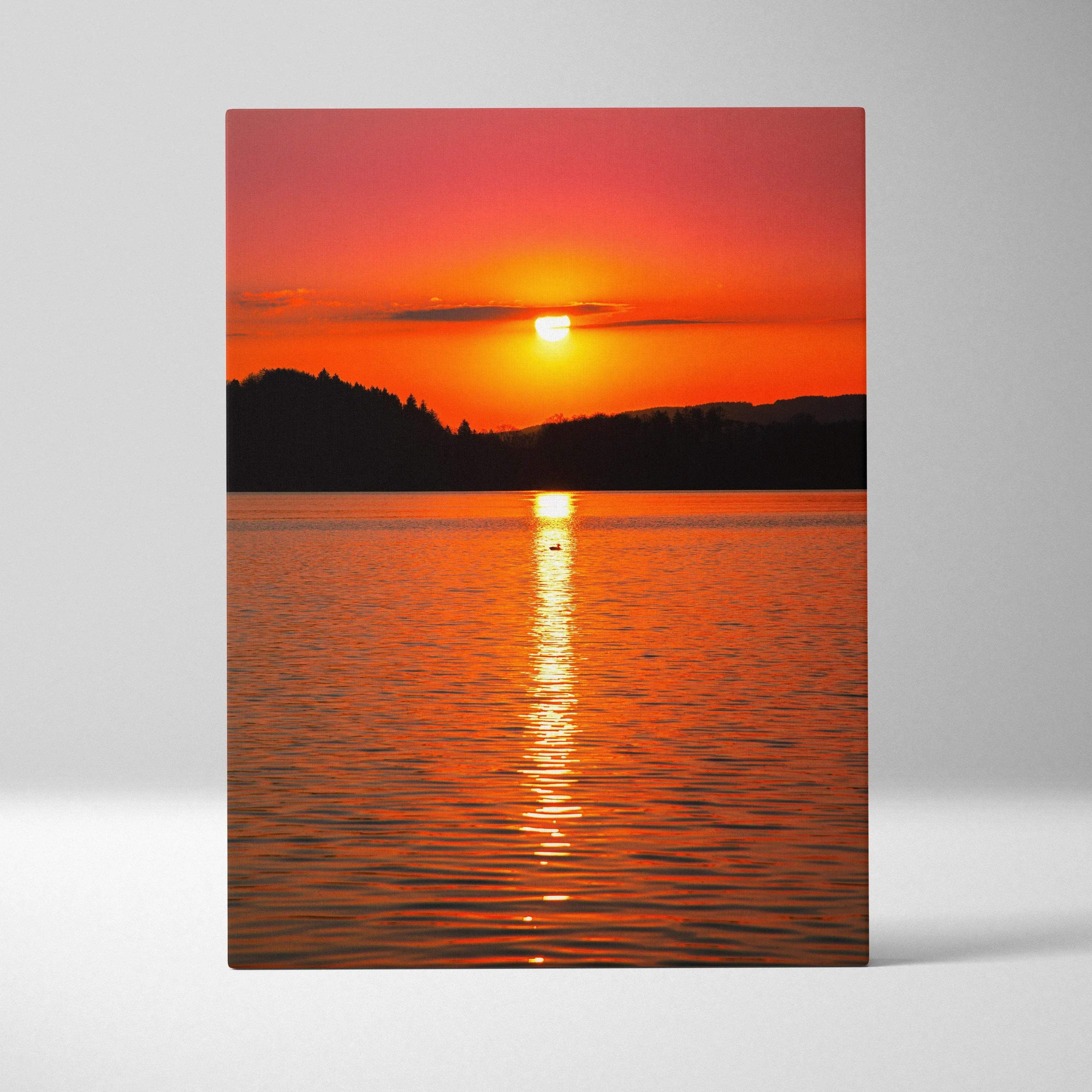 Vivid ocean sunset art canvas with vibrant orange sky and sun reflecting on calm water.