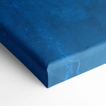 Aerial ocean shore canvas wall art print featuring deep blue textured surface with subtle gradient for coastal decor