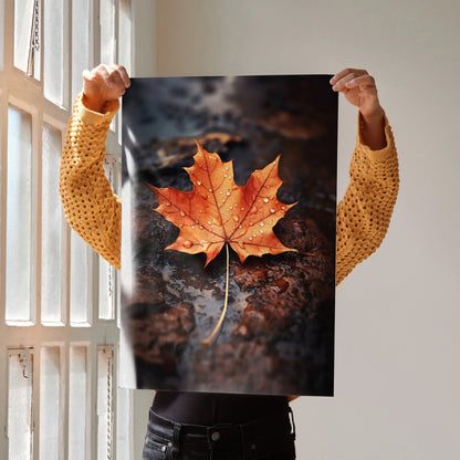 Vertical poster featuring vibrant orange autumn leaf on dark textured background, wall art with nature theme.