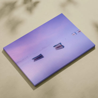 Purple abstract boats canvas print on foggy mirror lake in lilac pink blue tones