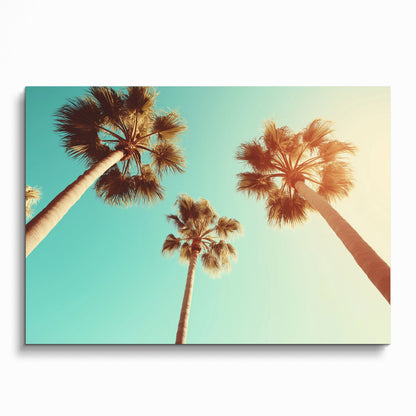Serene beach poster featuring digital art of palm trees against a blue sky, wall art with warm sunlight glow.