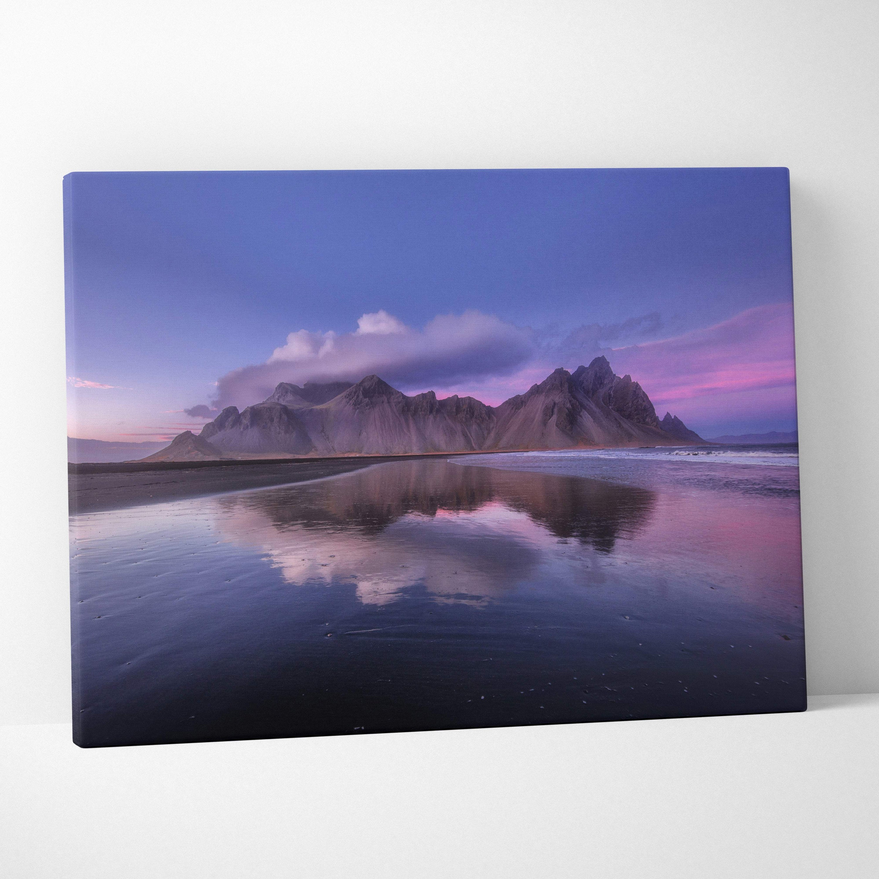 Iceland mountain beach canvas wall art print featuring a purple sunset reflection over a serene twilight landscape