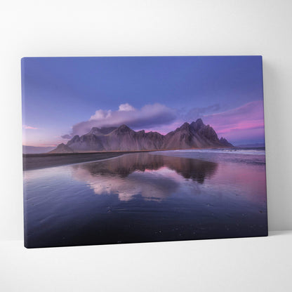 Iceland mountain beach canvas wall art print featuring a purple sunset reflection over a serene twilight landscape
