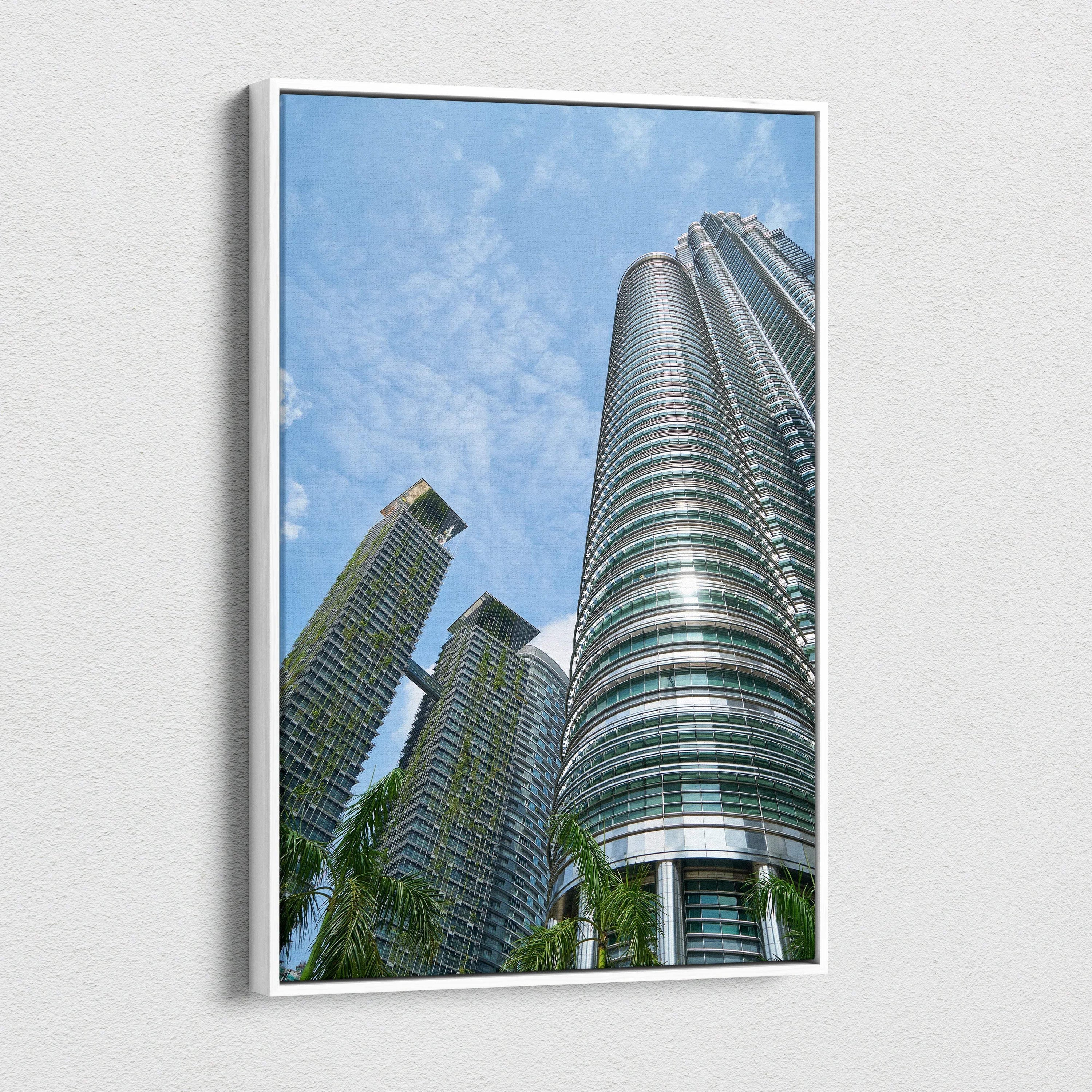 Urban architecture canvas wall art featuring modern skyscrapers against a blue sky.